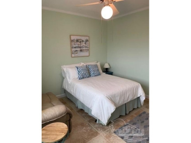This beautifully furnished, wheelchair-accessible corner unit on on Pensacola Country Club in Florida - for sale on GolfHomes.com, golf home, golf lot