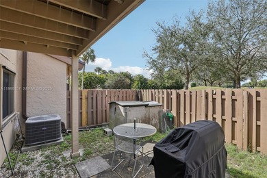 Step outside to your private backyard oasis with direct, serene on Davie Golf Club in Florida - for sale on GolfHomes.com, golf home, golf lot