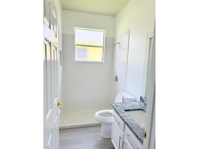 LOCATION AND MORE.   This is a gorgeous and renovated one single on Oaks National Golf Course in Florida - for sale on GolfHomes.com, golf home, golf lot