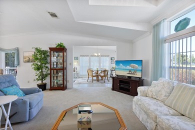 This 2005 home with 1,706sq ft of living space features the on Maple Leaf Golf and Country Club in Florida - for sale on GolfHomes.com, golf home, golf lot