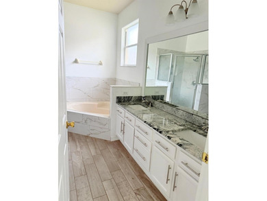 LOCATION AND MORE.   This is a gorgeous and renovated one single on Oaks National Golf Course in Florida - for sale on GolfHomes.com, golf home, golf lot