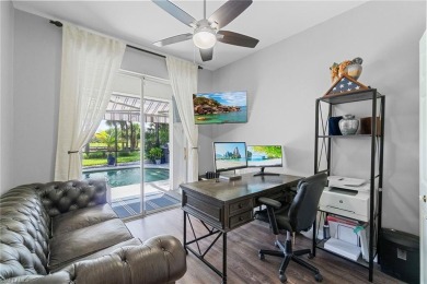 Live the indoor-outdoor lifestyle in this beautifully updated on Gateway Golf and Country Club in Florida - for sale on GolfHomes.com, golf home, golf lot