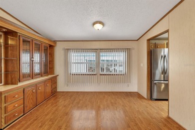 Welcome home to this charming 2 Bedroom, 2 Bathroom residence on Zellwood Station Country Club in Florida - for sale on GolfHomes.com, golf home, golf lot