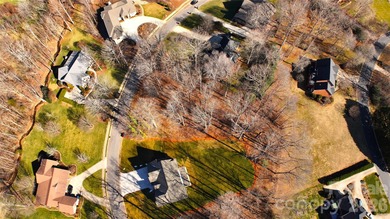 This fantastic half-acre lot offers an exceptional opportunity on Rock Barn Golf and Spa in North Carolina - for sale on GolfHomes.com, golf home, golf lot