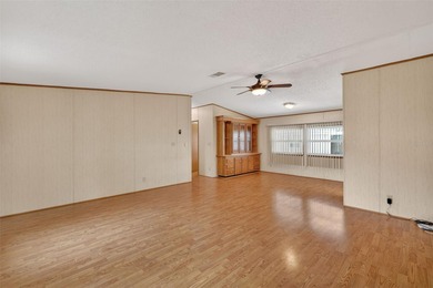 Welcome home to this charming 2 Bedroom, 2 Bathroom residence on Zellwood Station Country Club in Florida - for sale on GolfHomes.com, golf home, golf lot