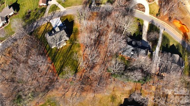 This fantastic half-acre lot offers an exceptional opportunity on Rock Barn Golf and Spa in North Carolina - for sale on GolfHomes.com, golf home, golf lot