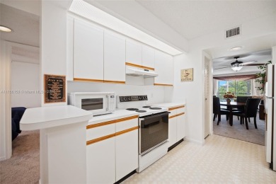 BRIGHT AND SPACIOUS CONDO, AVAILABLE IN THE SOUGHT-AFTER on Flamingo Lakes Country Club in Florida - for sale on GolfHomes.com, golf home, golf lot
