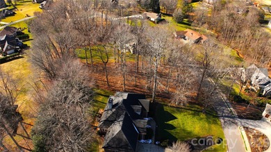 This fantastic half-acre lot offers an exceptional opportunity on Rock Barn Golf and Spa in North Carolina - for sale on GolfHomes.com, golf home, golf lot