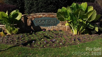 This fantastic half-acre lot offers an exceptional opportunity on Rock Barn Golf and Spa in North Carolina - for sale on GolfHomes.com, golf home, golf lot