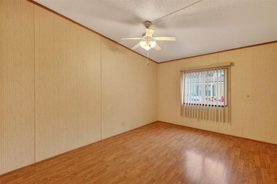 Welcome home to this charming 2 Bedroom, 2 Bathroom residence on Zellwood Station Country Club in Florida - for sale on GolfHomes.com, golf home, golf lot