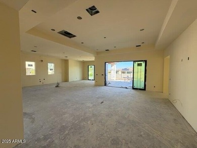 Brand-new custom home under construction with estimated on Estrella Mountain Ranch Golf Course in Arizona - for sale on GolfHomes.com, golf home, golf lot