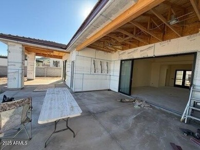 Brand-new custom home under construction with estimated on Estrella Mountain Ranch Golf Course in Arizona - for sale on GolfHomes.com, golf home, golf lot