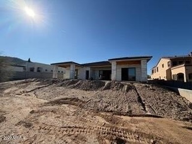 Brand-new custom home under construction with estimated on Estrella Mountain Ranch Golf Course in Arizona - for sale on GolfHomes.com, golf home, golf lot