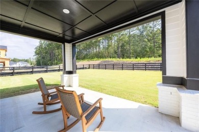 Welcome home to this executive home built by the Toll Brothers on Capital City Club Crabapple in Georgia - for sale on GolfHomes.com, golf home, golf lot
