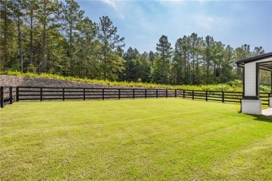 Welcome home to this executive home built by the Toll Brothers on Capital City Club Crabapple in Georgia - for sale on GolfHomes.com, golf home, golf lot