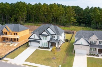 Welcome home to this executive home built by the Toll Brothers on Capital City Club Crabapple in Georgia - for sale on GolfHomes.com, golf home, golf lot