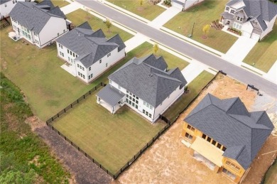 Welcome home to this executive home built by the Toll Brothers on Capital City Club Crabapple in Georgia - for sale on GolfHomes.com, golf home, golf lot