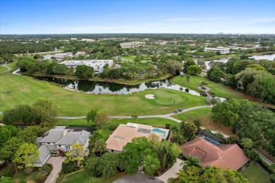 Stunning 4-bedroom, 3.5-bathroom pool home with a 2-car garage on PGA National Golf Club in Florida - for sale on GolfHomes.com, golf home, golf lot