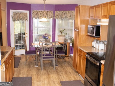 Vacation at your home with separate dining and living room 3 on Fairfield Plantation Golf and Country Club in Georgia - for sale on GolfHomes.com, golf home, golf lot