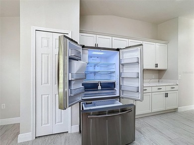 Some photos are virtually  staged. ***See the FULL LENGTH VIDEO on Stonegate Golf Club in Florida - for sale on GolfHomes.com, golf home, golf lot