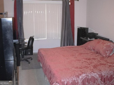 Vacation at your home with separate dining and living room 3 on Fairfield Plantation Golf and Country Club in Georgia - for sale on GolfHomes.com, golf home, golf lot