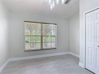 Some photos are virtually  staged. ***See the FULL LENGTH VIDEO on Stonegate Golf Club in Florida - for sale on GolfHomes.com, golf home, golf lot