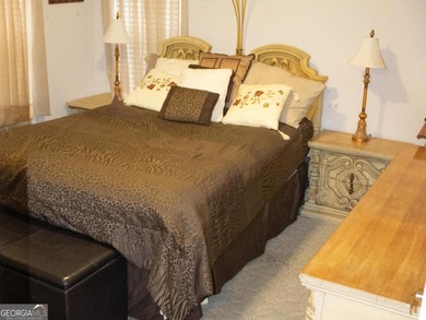 Vacation at your home with separate dining and living room 3 on Fairfield Plantation Golf and Country Club in Georgia - for sale on GolfHomes.com, golf home, golf lot