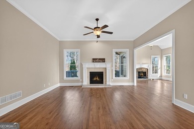 Located in BridgeMill, this well-maintained home offers the on Bridgemill Golf Club in Georgia - for sale on GolfHomes.com, golf home, golf lot