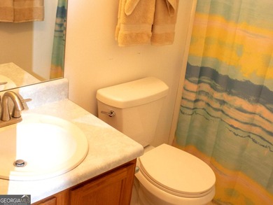 Vacation at your home with separate dining and living room 3 on Fairfield Plantation Golf and Country Club in Georgia - for sale on GolfHomes.com, golf home, golf lot