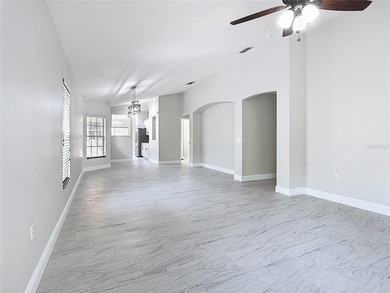 Some photos are virtually  staged. ***See the FULL LENGTH VIDEO on Stonegate Golf Club in Florida - for sale on GolfHomes.com, golf home, golf lot