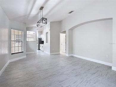 Some photos are virtually  staged. ***See the FULL LENGTH VIDEO on Stonegate Golf Club in Florida - for sale on GolfHomes.com, golf home, golf lot