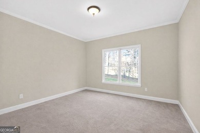 Located in BridgeMill, this well-maintained home offers the on Bridgemill Golf Club in Georgia - for sale on GolfHomes.com, golf home, golf lot