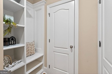 Located in BridgeMill, this well-maintained home offers the on Bridgemill Golf Club in Georgia - for sale on GolfHomes.com, golf home, golf lot