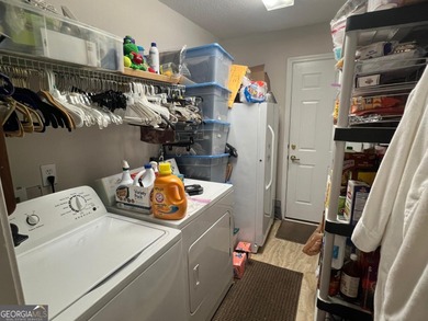 Stainless Steel stove, refrigerator, and new flooring replaced on Fairfield Plantation Golf and Country Club in Georgia - for sale on GolfHomes.com, golf home, golf lot