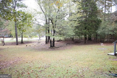 Stainless Steel stove, refrigerator, and new flooring replaced on Fairfield Plantation Golf and Country Club in Georgia - for sale on GolfHomes.com, golf home, golf lot