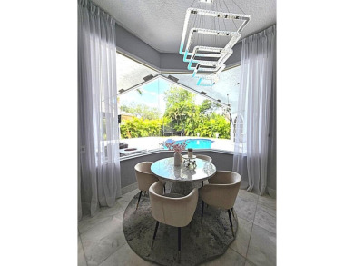 Stunning Remodeled Home in Prestigious Eagle Trace!Welcome to on TPC Eagle Trace in Florida - for sale on GolfHomes.com, golf home, golf lot