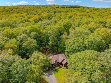 Welcome to 'Fireside'!  This lovely lake cottage nestled inside on Alpine Lake Resort in West Virginia - for sale on GolfHomes.com, golf home, golf lot