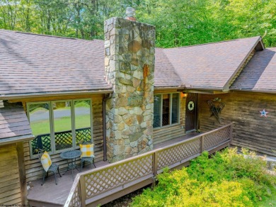 Welcome to 'Fireside'!  This lovely lake cottage nestled inside on Alpine Lake Resort in West Virginia - for sale on GolfHomes.com, golf home, golf lot