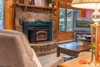 Welcome to 'Fireside'!  This lovely lake cottage nestled inside on Alpine Lake Resort in West Virginia - for sale on GolfHomes.com, golf home, golf lot