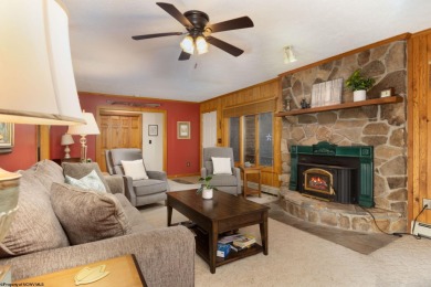Welcome to 'Fireside'!  This lovely lake cottage nestled inside on Alpine Lake Resort in West Virginia - for sale on GolfHomes.com, golf home, golf lot
