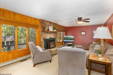Welcome to 'Fireside'!  This lovely lake cottage nestled inside on Alpine Lake Resort in West Virginia - for sale on GolfHomes.com, golf home, golf lot