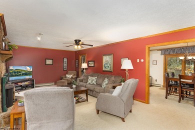 Welcome to 'Fireside'!  This lovely lake cottage nestled inside on Alpine Lake Resort in West Virginia - for sale on GolfHomes.com, golf home, golf lot