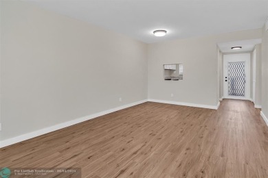 TURNKEY! NEWLY RENOVATED! Welcome to your dream home in the on Sunrise Lakes Phase III in Florida - for sale on GolfHomes.com, golf home, golf lot