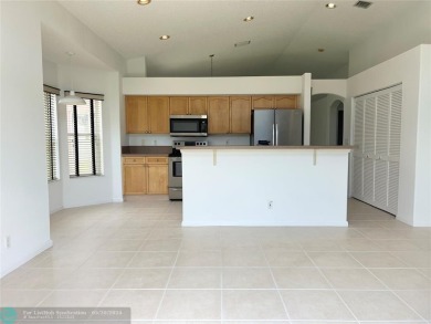 Don't miss this move in ready 3 bedroom, 2 bathroom, 2 car on Atlantic National Golf and Country Club in Florida - for sale on GolfHomes.com, golf home, golf lot