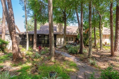 Welcome to your DREAM VILLA nestled in the sought after on Tarpon Woods Golf Club in Florida - for sale on GolfHomes.com, golf home, golf lot