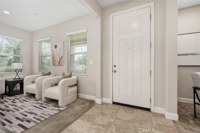 Step onto the inviting front porch and into a luxurious on RedHawk Golf Club in California - for sale on GolfHomes.com, golf home, golf lot
