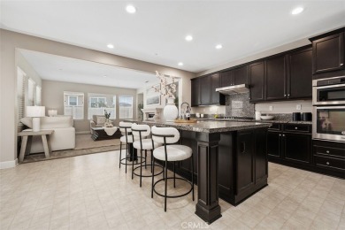 Step onto the inviting front porch and into a luxurious on RedHawk Golf Club in California - for sale on GolfHomes.com, golf home, golf lot
