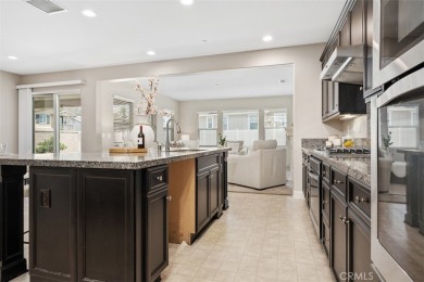 Step onto the inviting front porch and into a luxurious on RedHawk Golf Club in California - for sale on GolfHomes.com, golf home, golf lot