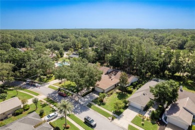 Welcome to your DREAM VILLA nestled in the sought after on Tarpon Woods Golf Club in Florida - for sale on GolfHomes.com, golf home, golf lot