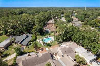 Welcome to your DREAM VILLA nestled in the sought after on Tarpon Woods Golf Club in Florida - for sale on GolfHomes.com, golf home, golf lot